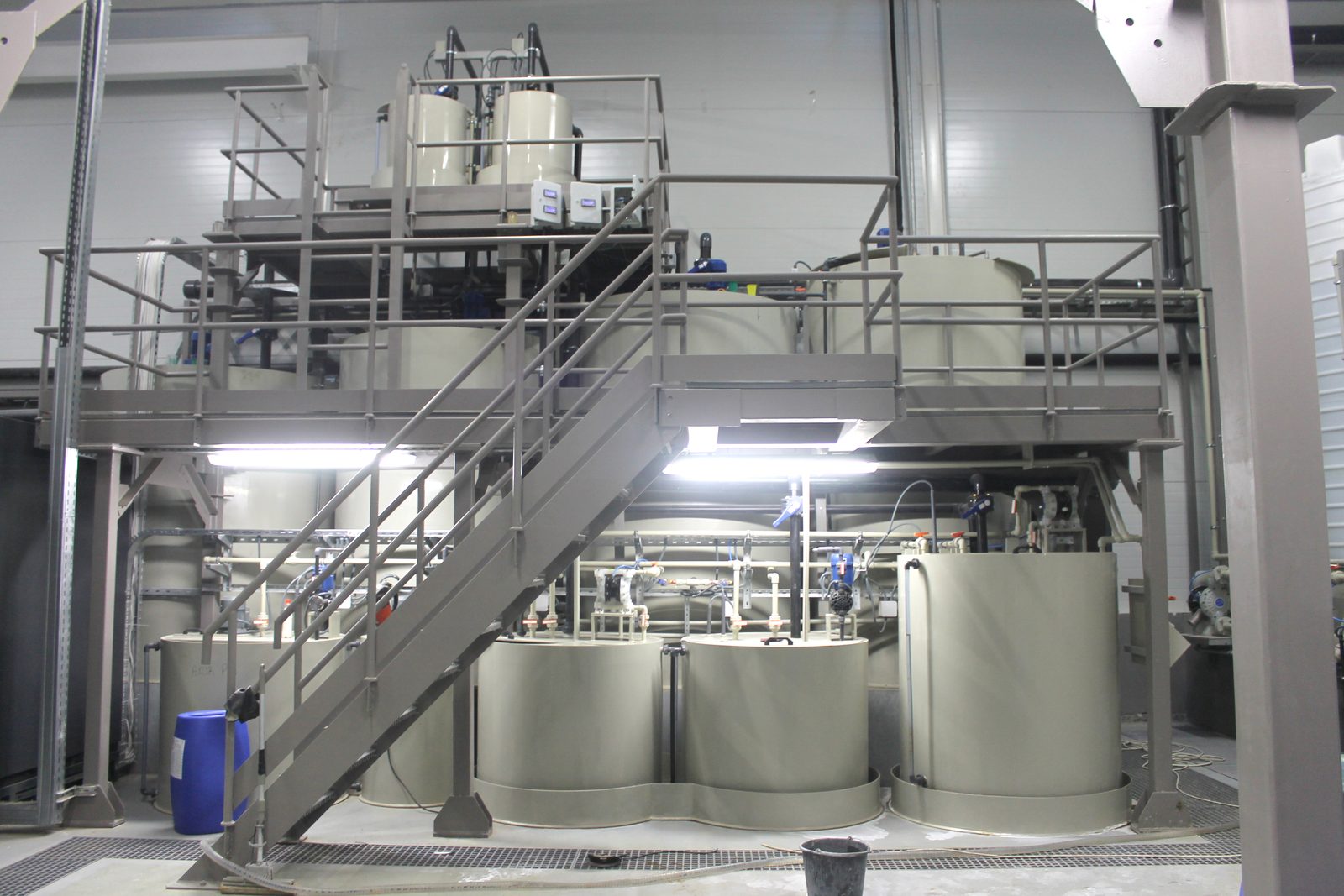 AXOR Industry, Ukraine — multi-level chemical treatment plant with GESU-manufactured PP tanks and service platforms