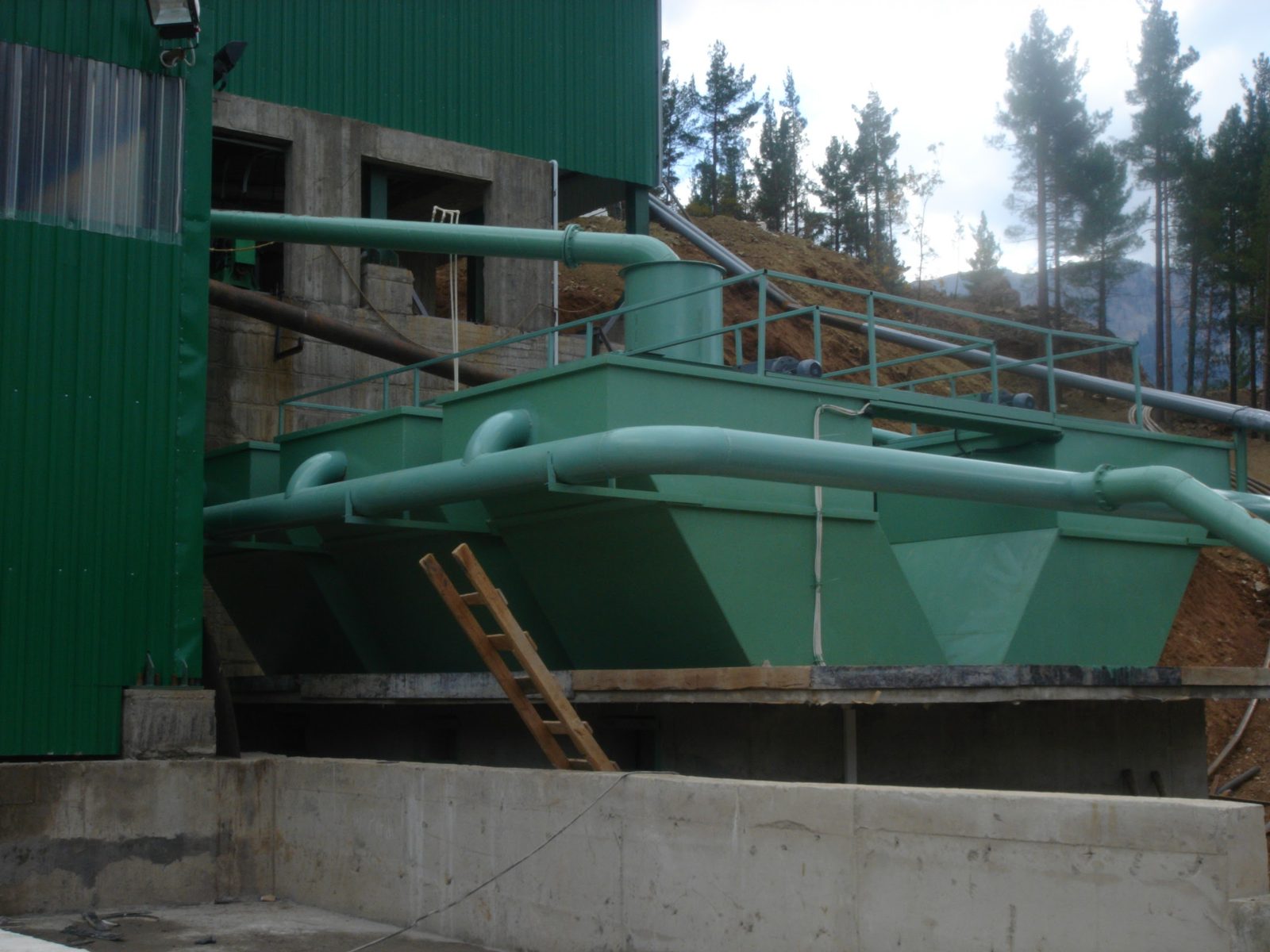 Wastewater treatment at a chrome ore beneficiation plant in Adana, Türkiye — cone-bottomed settling units, site photo from November 2007