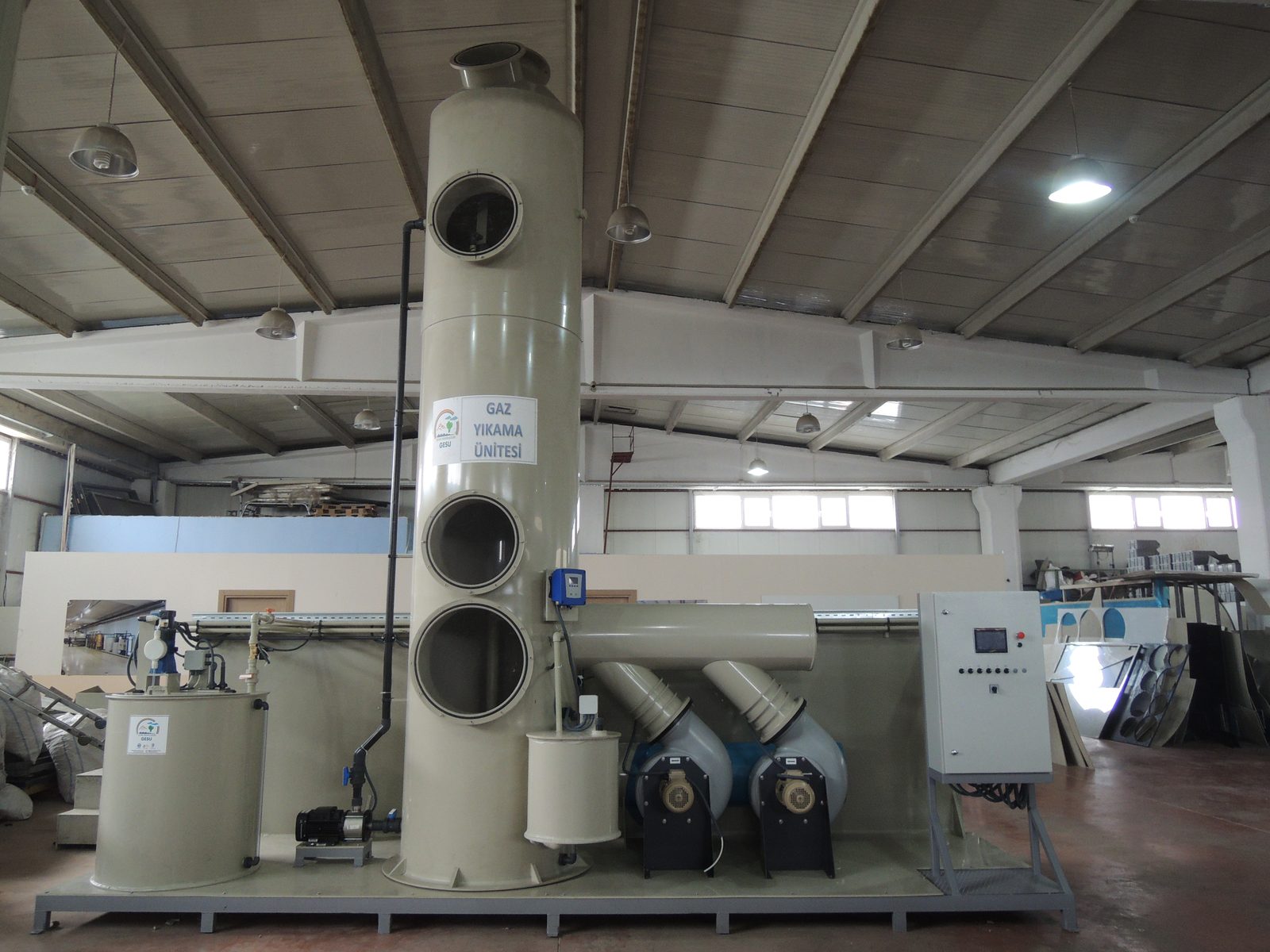 GESU-manufactured Gas Scrubbing Unit for Gaziantep OIZ — scrubber tower, dosing tank, twin fans and control panel