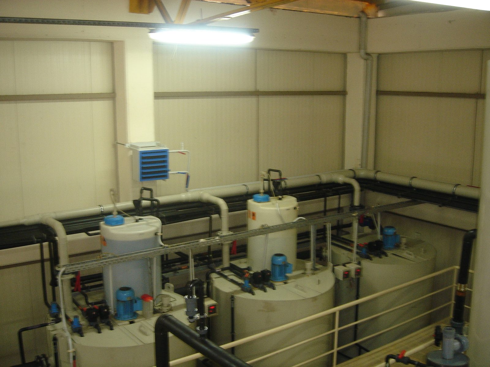 Chemical treatment unit at the Karsan wastewater treatment plant — process tanks with mixers and dosing tanks